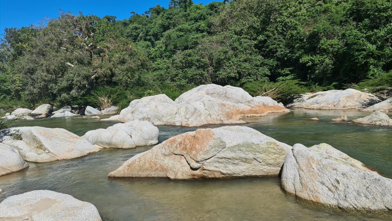 Senda Watapuy Hotel Ел Заино Екстериор снимка Boulders in the river